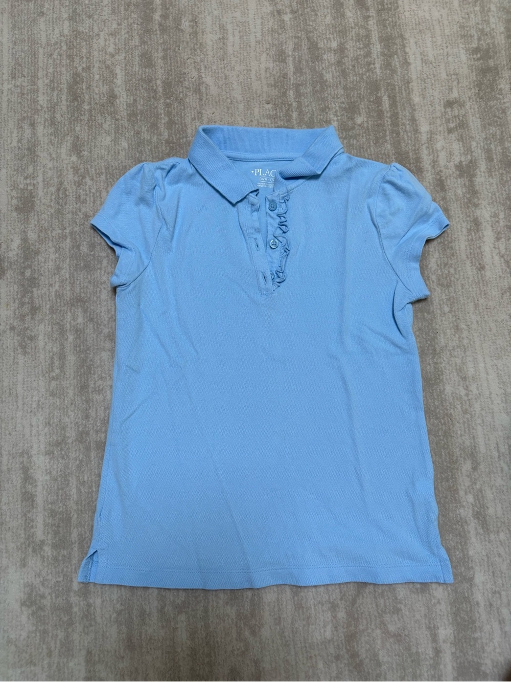 The Children's Place Light Blue Polo shirt with ruffle trim. Size M (7-8)